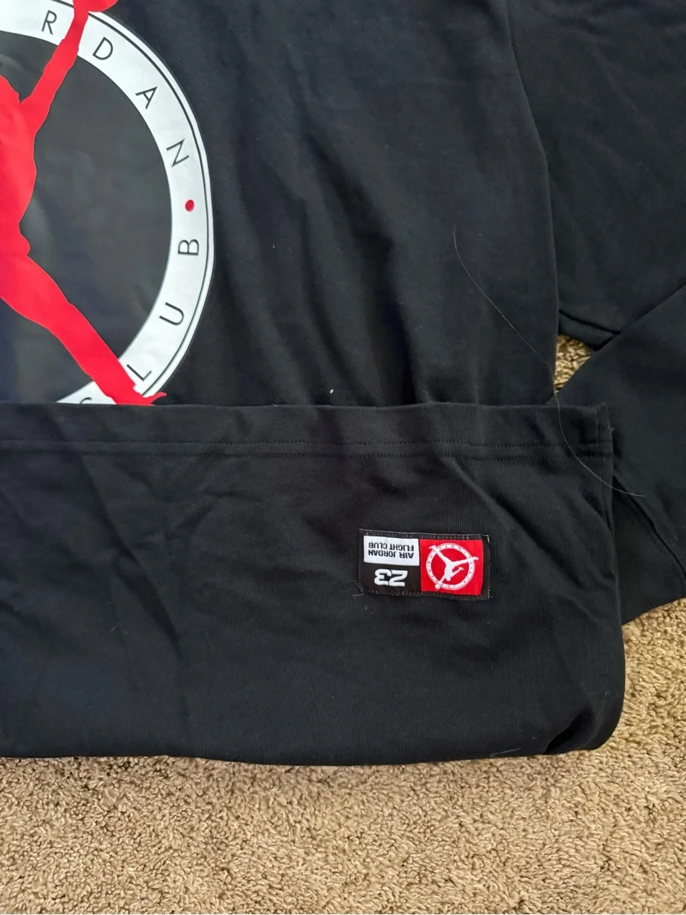 Jordan Black Crewneck Shirt with Red Jumpman Graphic